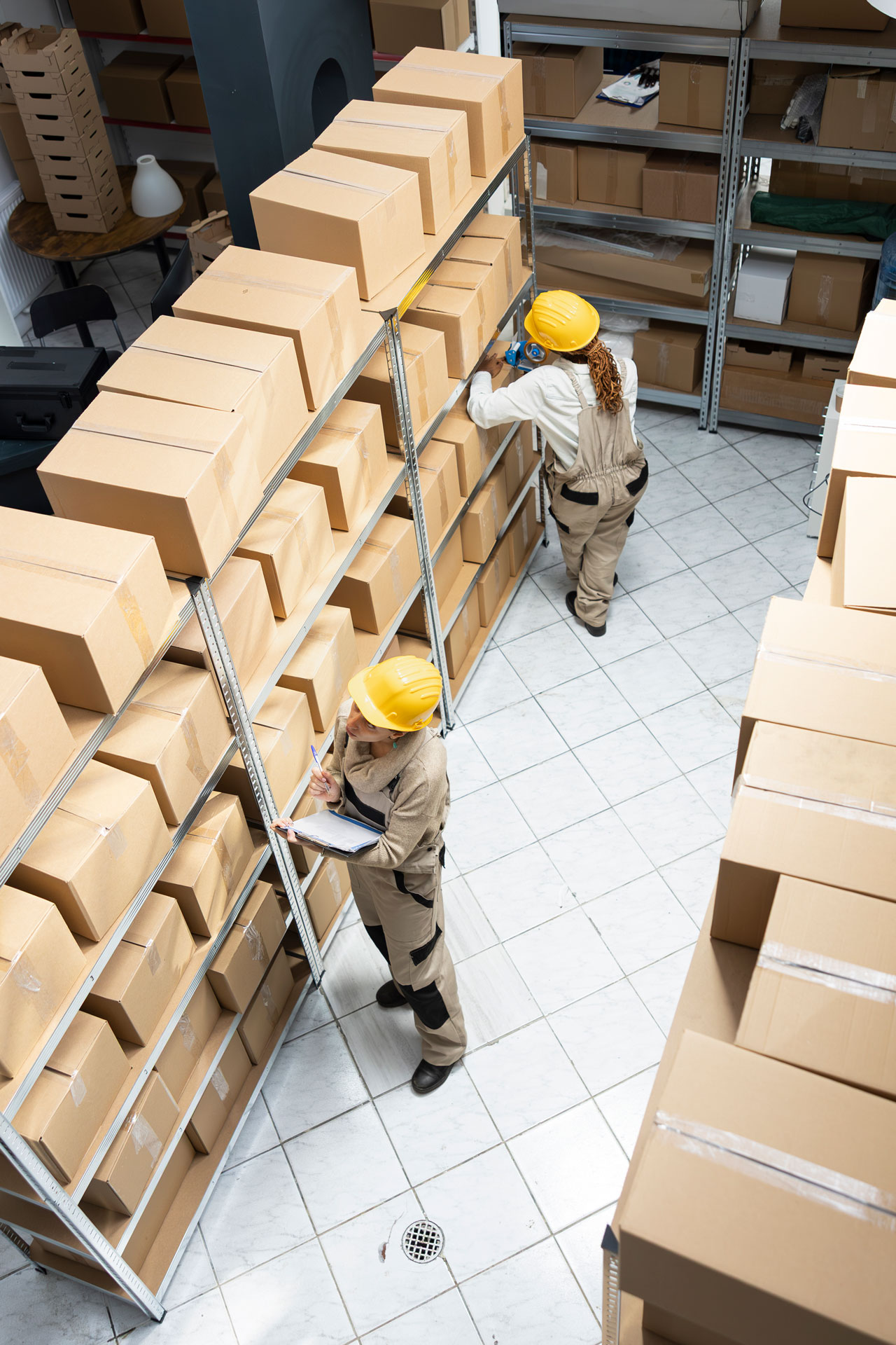 diverse warehouse staff ensuring smooth product distribution by managing inventory handling